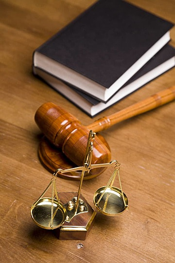 Law books and legal gavel